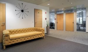 Waiting area with yellow chair